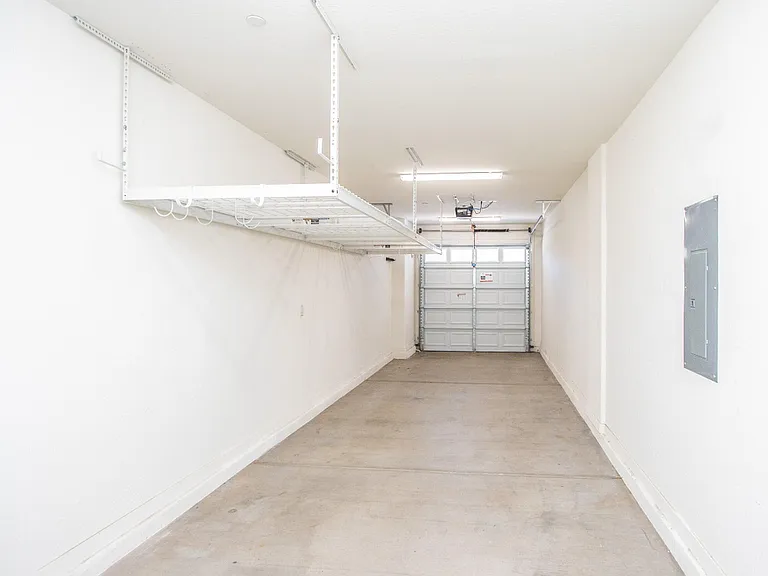 2-Car Tandem Garage with Overhead Storage Space
