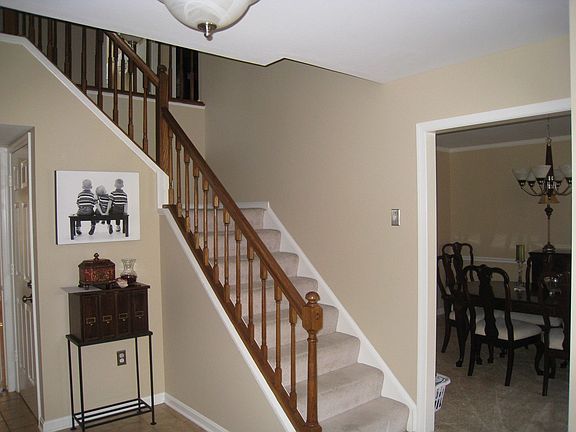 Charming Entry with Turned Staircase