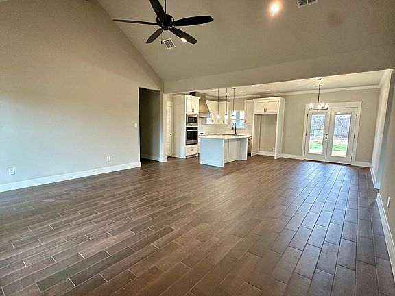 Open concept living room, kitchen and dining