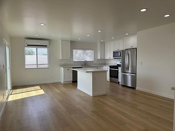 Great Room large enough for dining table, desk area under window, family room, flat screen RG6 wall ready to go!