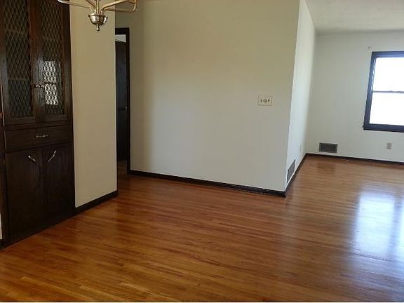 Dining room is spacious for big family get together.