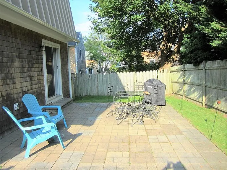 Sliders from kitchen open onto patio
