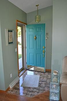 The entry has a large coat closet and is bright and cheerful.  Perfect for inviting your family and friends into your home.  