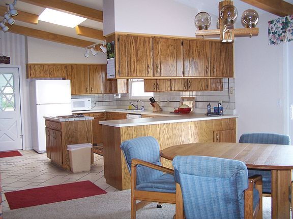 Open spacious country kitchen and dining room