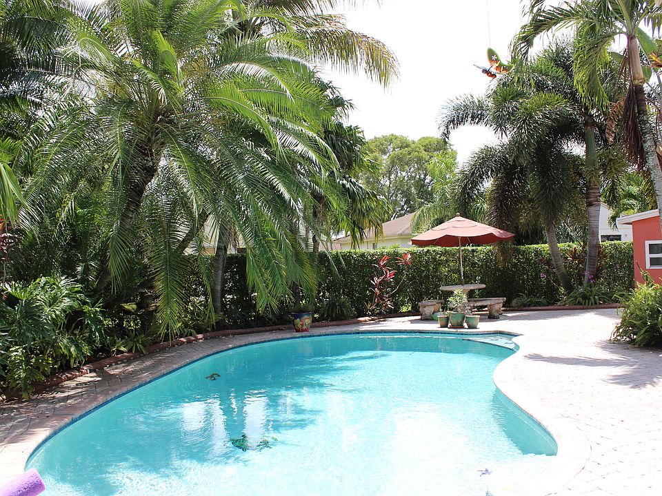 pool with outdoor table