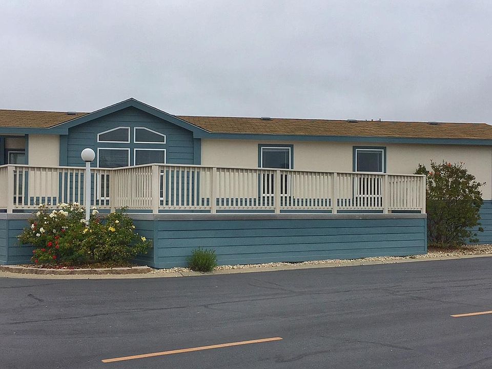 Freshly painted exterior facing golf course, and ocean
