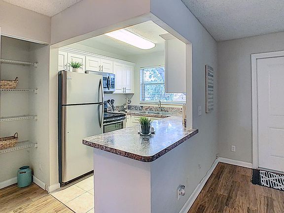 Kitchens with stainless steel appliances are available to rent.
