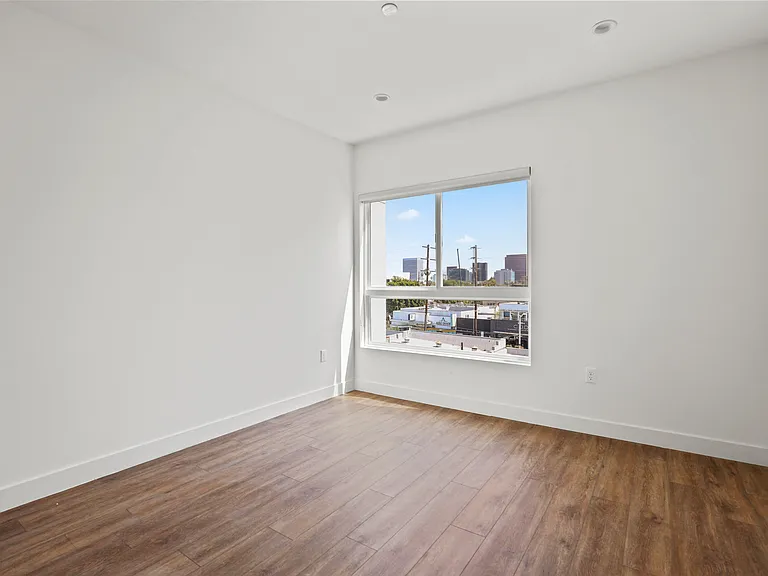Bedroom with Windows and Vinyl Flooring