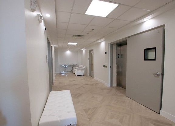 Elevator and hallway to condos