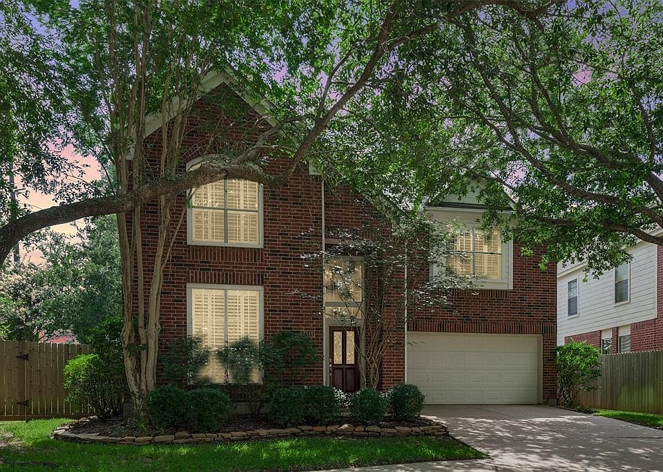 Tucked Away in The Enclave, a small neighborhood and built by Perry Homes, this beautiful Two Story boasts an attractive Elevation, Mature Trees, and Backs to Oyster Creek. No Back Neighbors and Larger Lot Size add to the desirability of this gem.