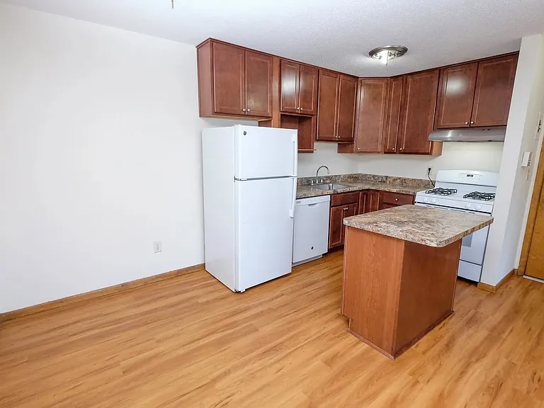 Welcome to Central Lakes of Uptown, where modern design meets comfort. This spacious kitchen features sleek cabinetry, updated appliances, and a beautiful island perfect for entertaining. Elevate your lifestyle todayschedule a visit now!