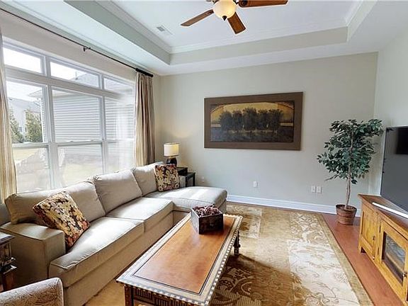 The spacious living area makes for a wonderful place to entertain, relax or watch your favorite movie.
