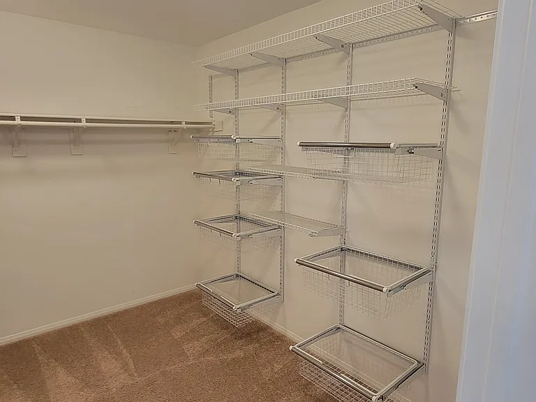 Primary walk-in closet