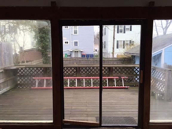 Deck area is large enough for table and patio chairs.