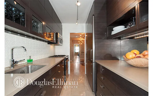 Sold by Douglas Elliman | media 18