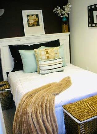 Small private bedroom area with barn door