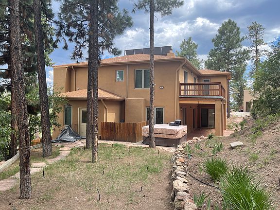 Backyard with trees and the hot-tub