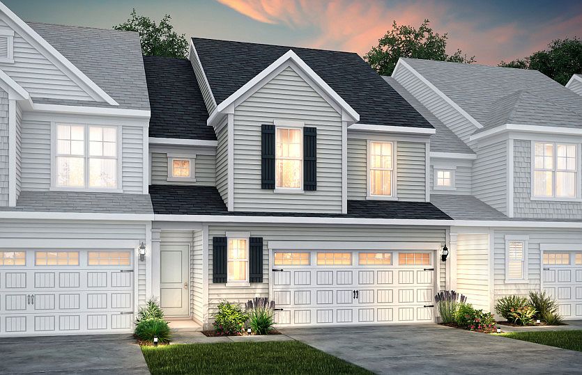 Palomino Exterior 4 features siding, covered front door and 2-car front load garage