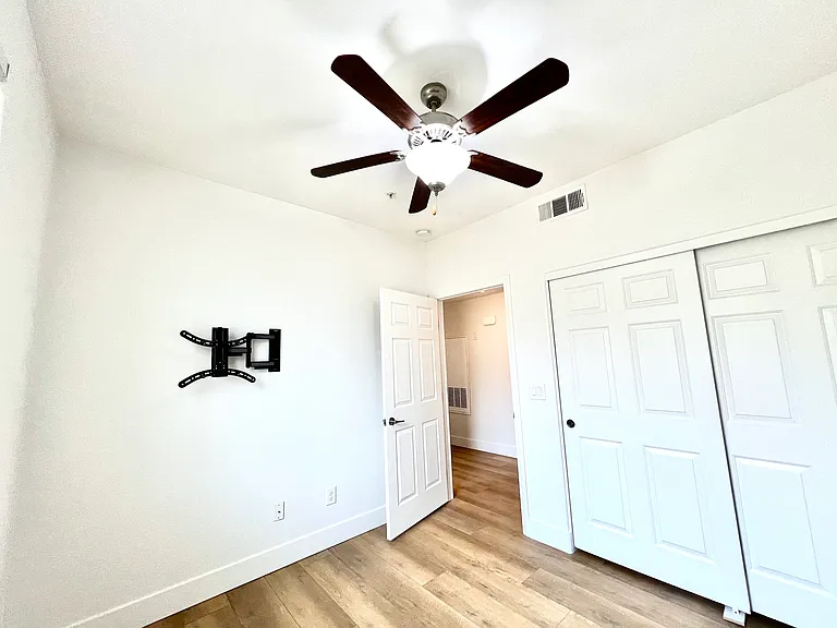 Bedroom 3 with ceiling light/fan and clothes closet