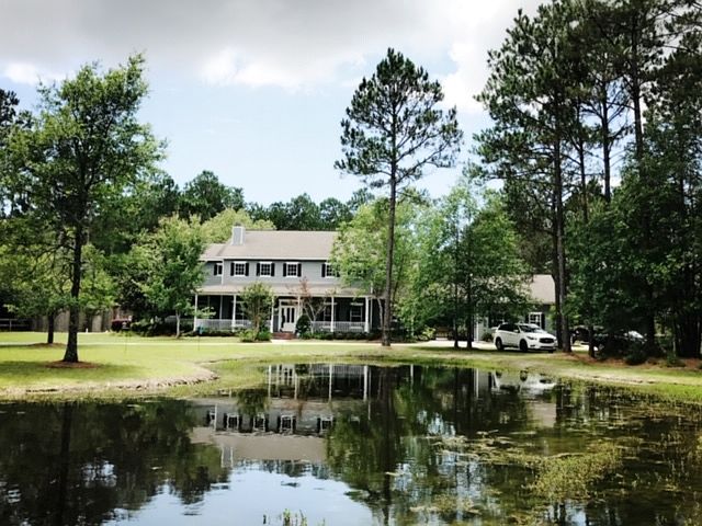 Front of House and Pond