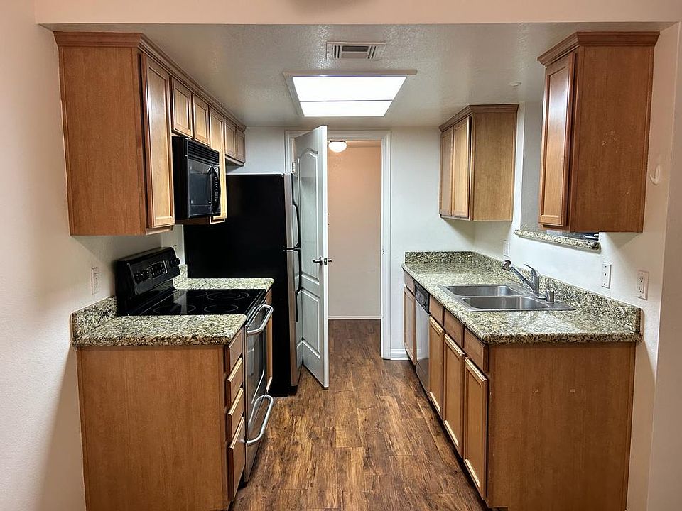 Kitchen with walk in closet and laundry room