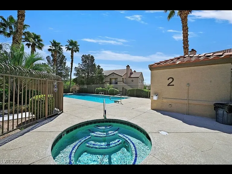 Hot Tub located in the community pool area which is just a couple steps aways from the unit.