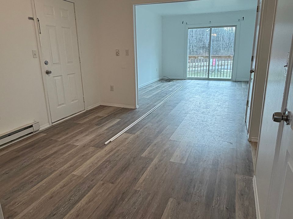 Dining area is open to living area with private balcony