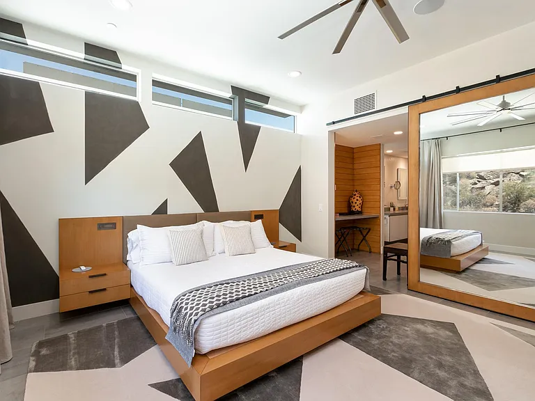 The Mountain Bedroom with view to en suite bath and walk-in closet.