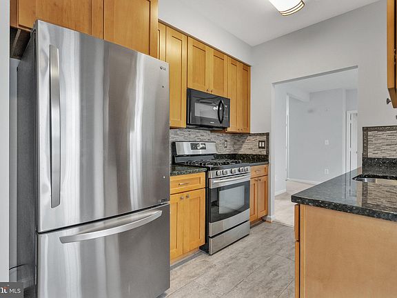 5th image of 5947 Founders Hill Dr Unit 203