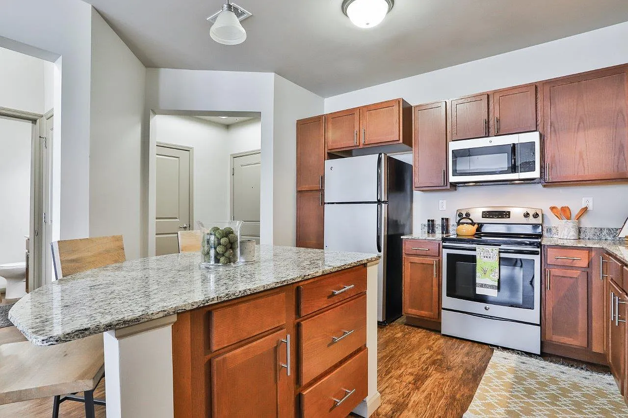 Residences at The Streets of St. Charles Apartment Homes — Photo 2