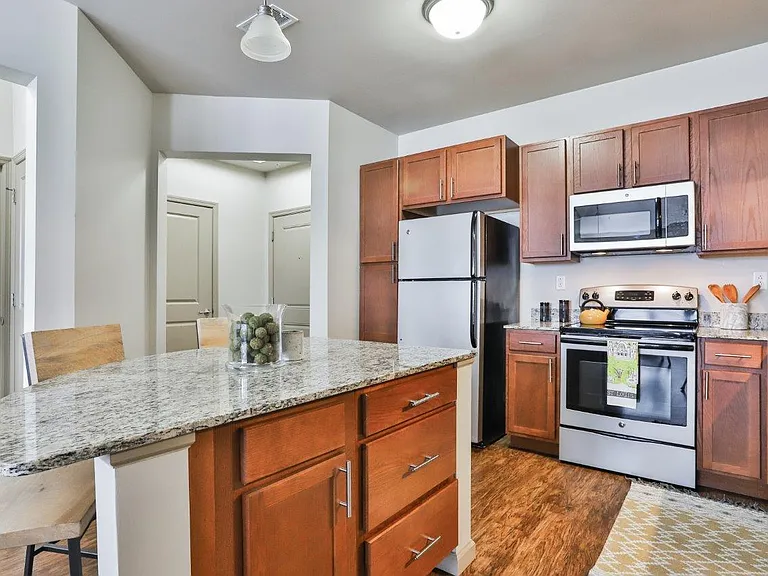 Residences at The Streets of St. Charles Apartment Homes — Photo 2