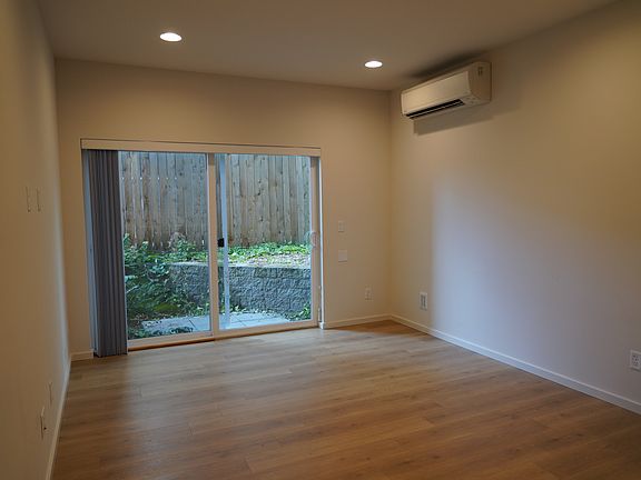 Living Room:
Air Conditioning and back patio