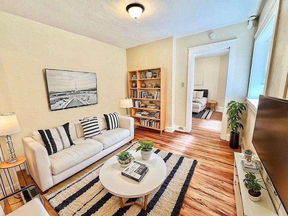 Immerse yourself in the tranquility of this chic urban bedroom, perfect for comfort and relaxation.