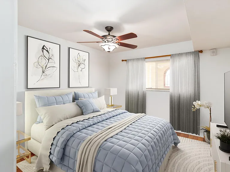 Guest Bedroom with modern zebra style blinds.