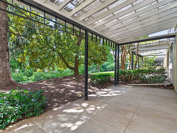 Enjoy your own private patio with easy access to the pool, tennis courts, and trails