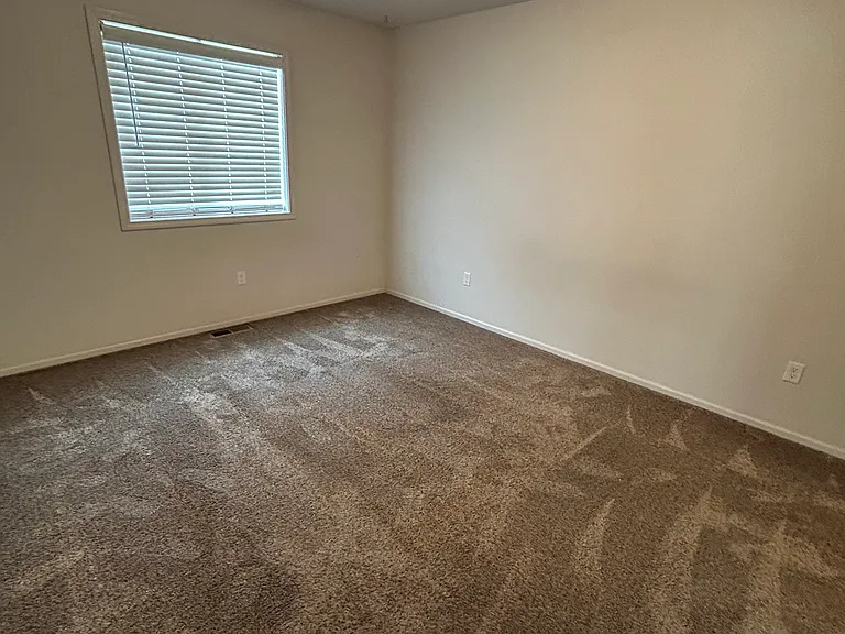 Bedroom 1 with walk-in closet