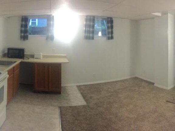 Kitchen/Family Room with the back entry door on the right.