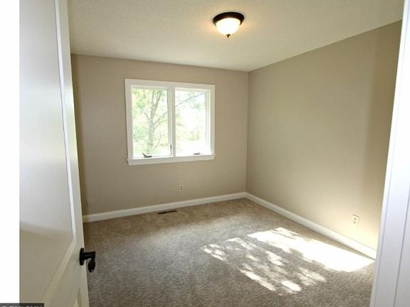 5th image of 9219 James Ave N