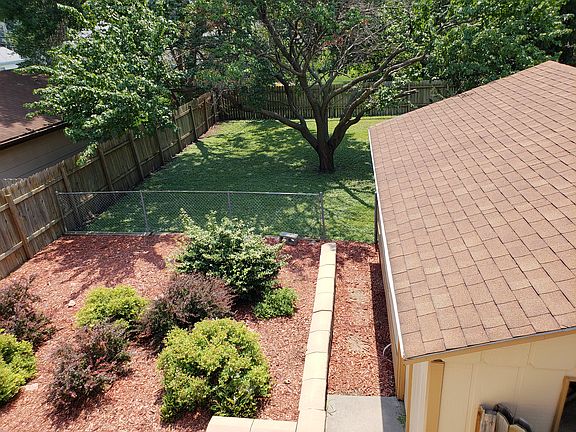 Backyard includes large patio