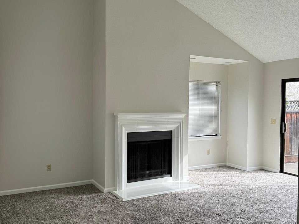 Living room with vaulted ceiling