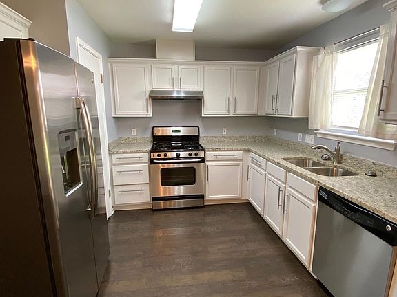 Fully-equipped kitchen with a large frig, stove, oven, microwave, dishwashwer, disposal and lots of cabinet space.