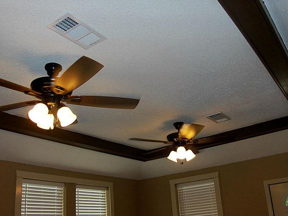 Main bedroom with 2 ceiling fans