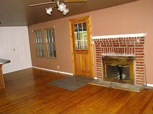 Hardwood floors and Fireplace.
