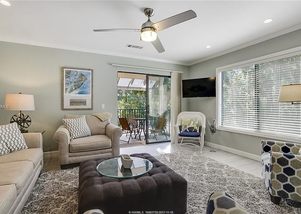 Beautiful and  spacious living area with deck and exterior window to bring in extra light.