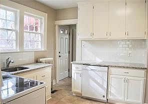 New granite and subway tile backsplash