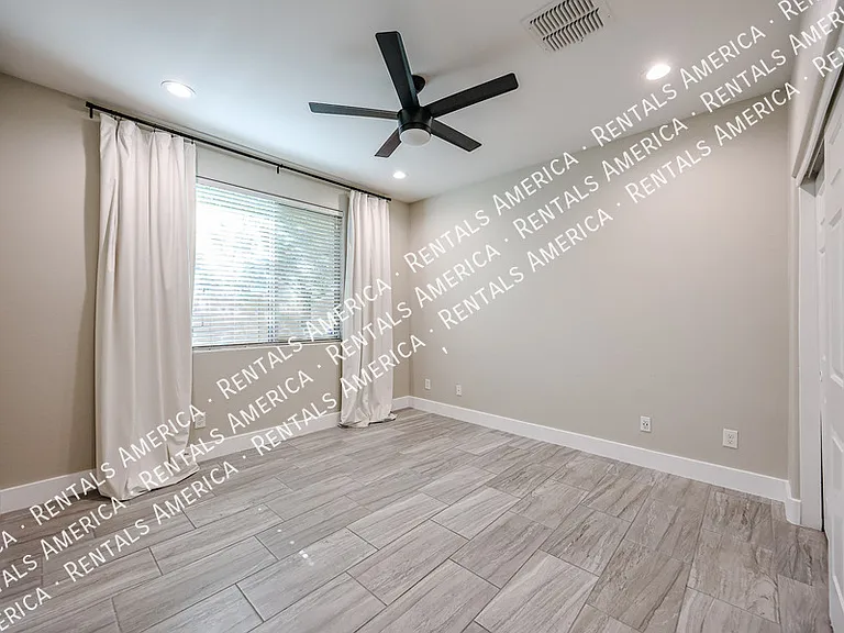 7855 W Rock Springs Dr — Photo 12