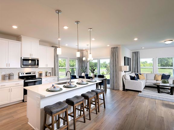 The open-concept living space provides the perfect space to entertain friends and family.