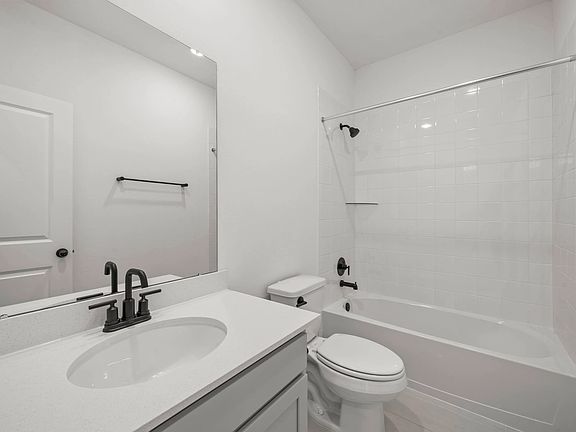 Second bath. Note Sample product photo - actual exterior and interior selections may vary by homesi