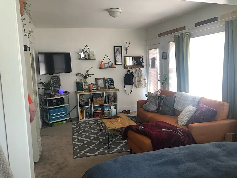 Although just a studio, inviting furnishing can make it homey...