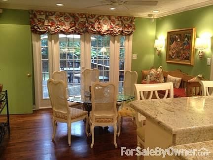 Breakfast Room
						:
						Built-in Bose speakers
French doors to DR and to deck
Window treatments stay.